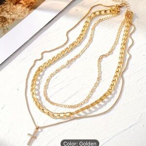 Elegant Gold Layered Necklace with Cross Pendant